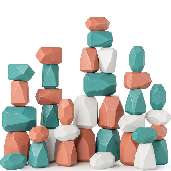 Colorful geometric stone blocks stacked on a white background